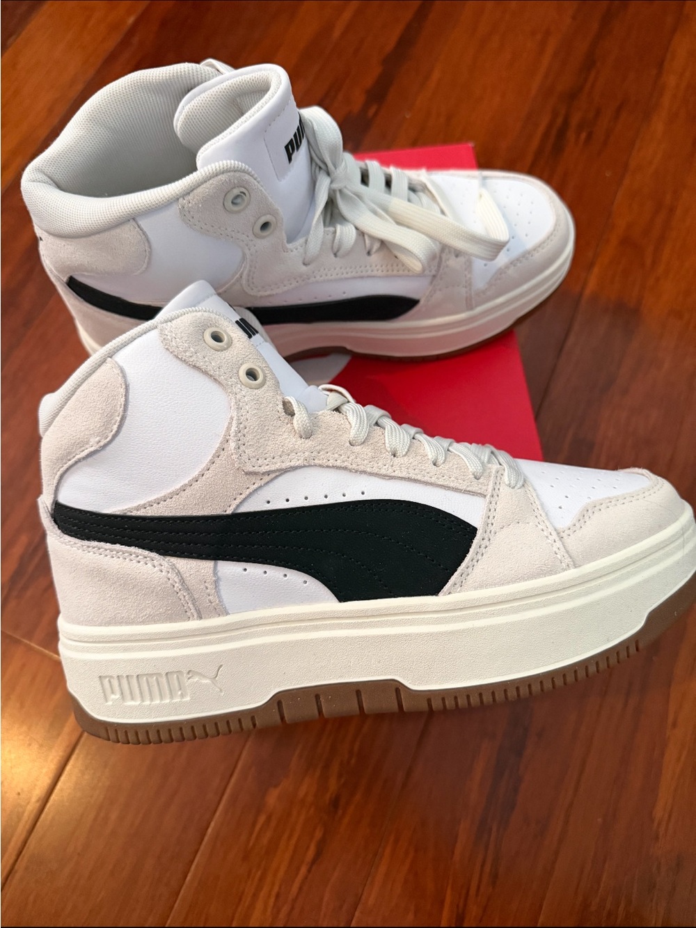 Puma Women's White High-Top Sneakers with Black Formstrip